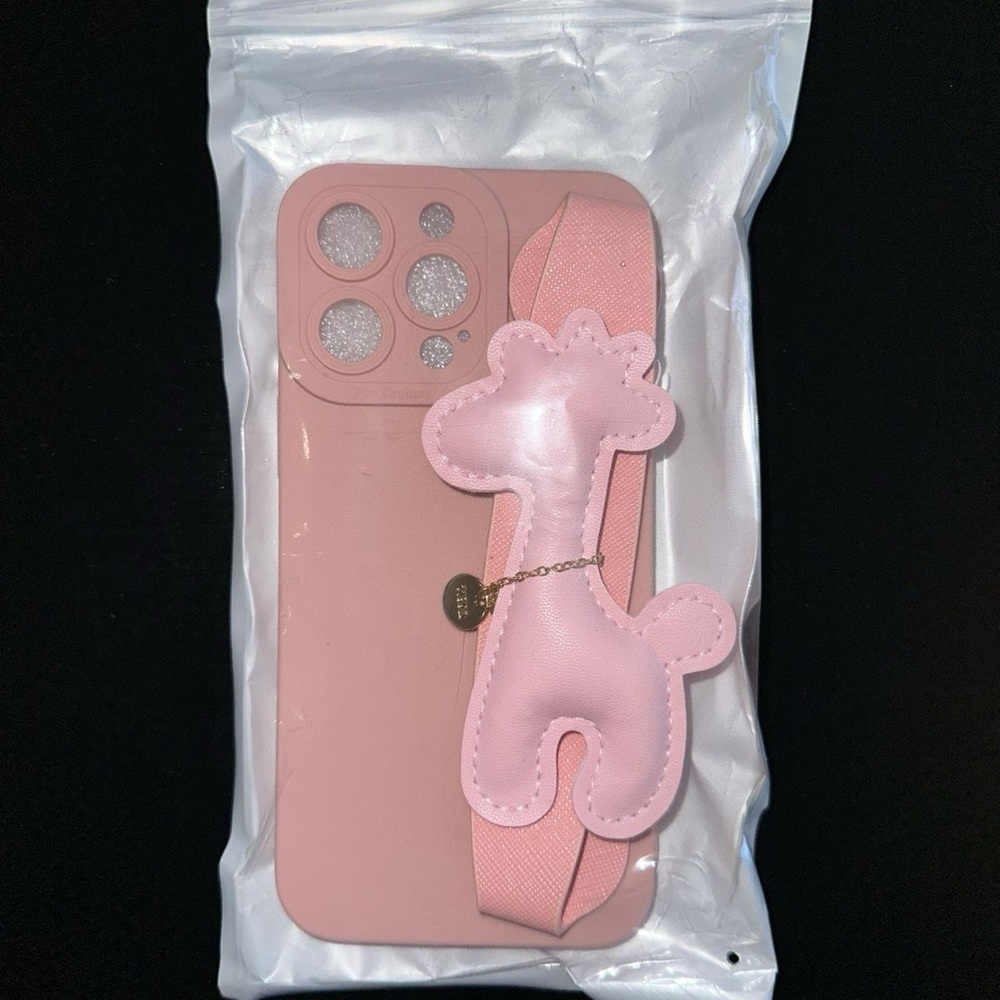 Pink giraffe phone case.